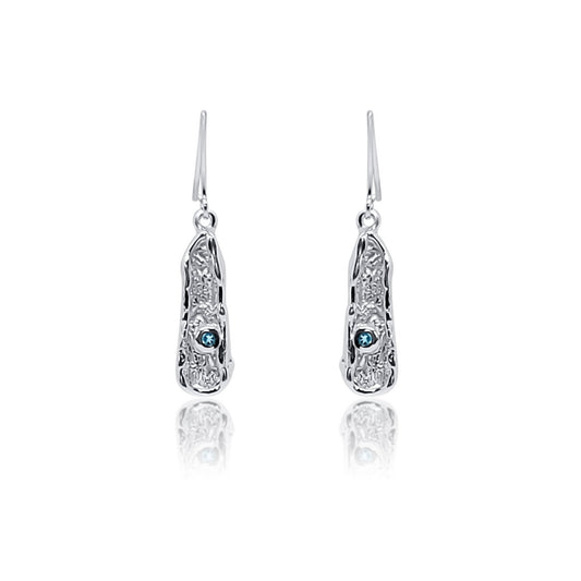 front view Blue topaz and organic textured sterling silver dangly earrings. one of a kind handcrafted silver textured earring with natural blue topaz