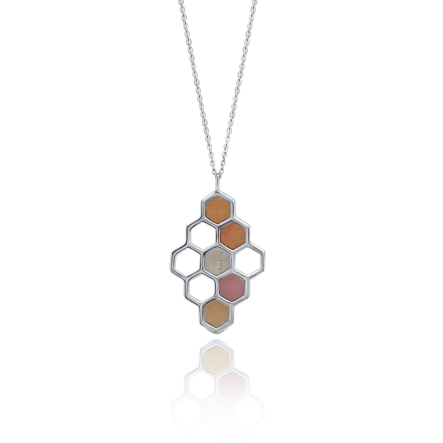 silver honeycomb pendant necklace with rose and gold resin infill and small citrine gemstone