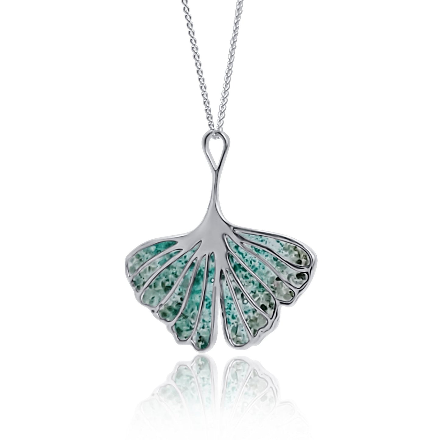 angled view of Nanahana green Ginkgo Leaf Silver Pendant Necklace with malachite, emeralds and resin inlay