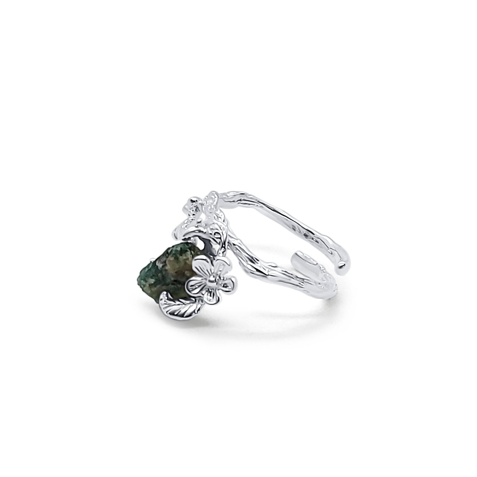 side view of adjustable raw cut emerald ring sterling silver floral setting