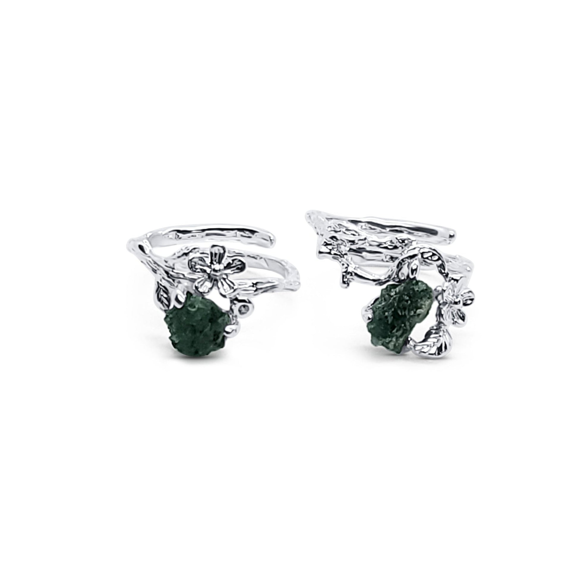 two silver flower and leaf adjustable rings with natural emerald stone