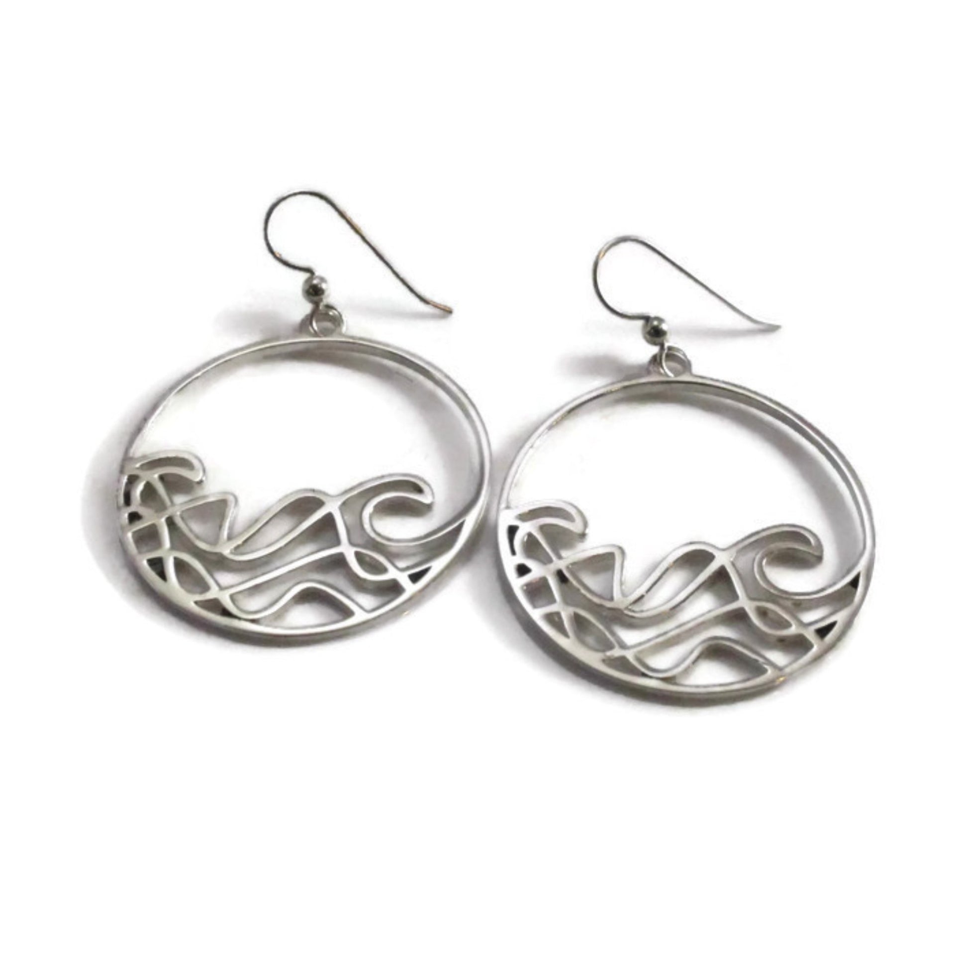 Sombrio big wave ocean surf earrings. Circle earrings with ocean wave design