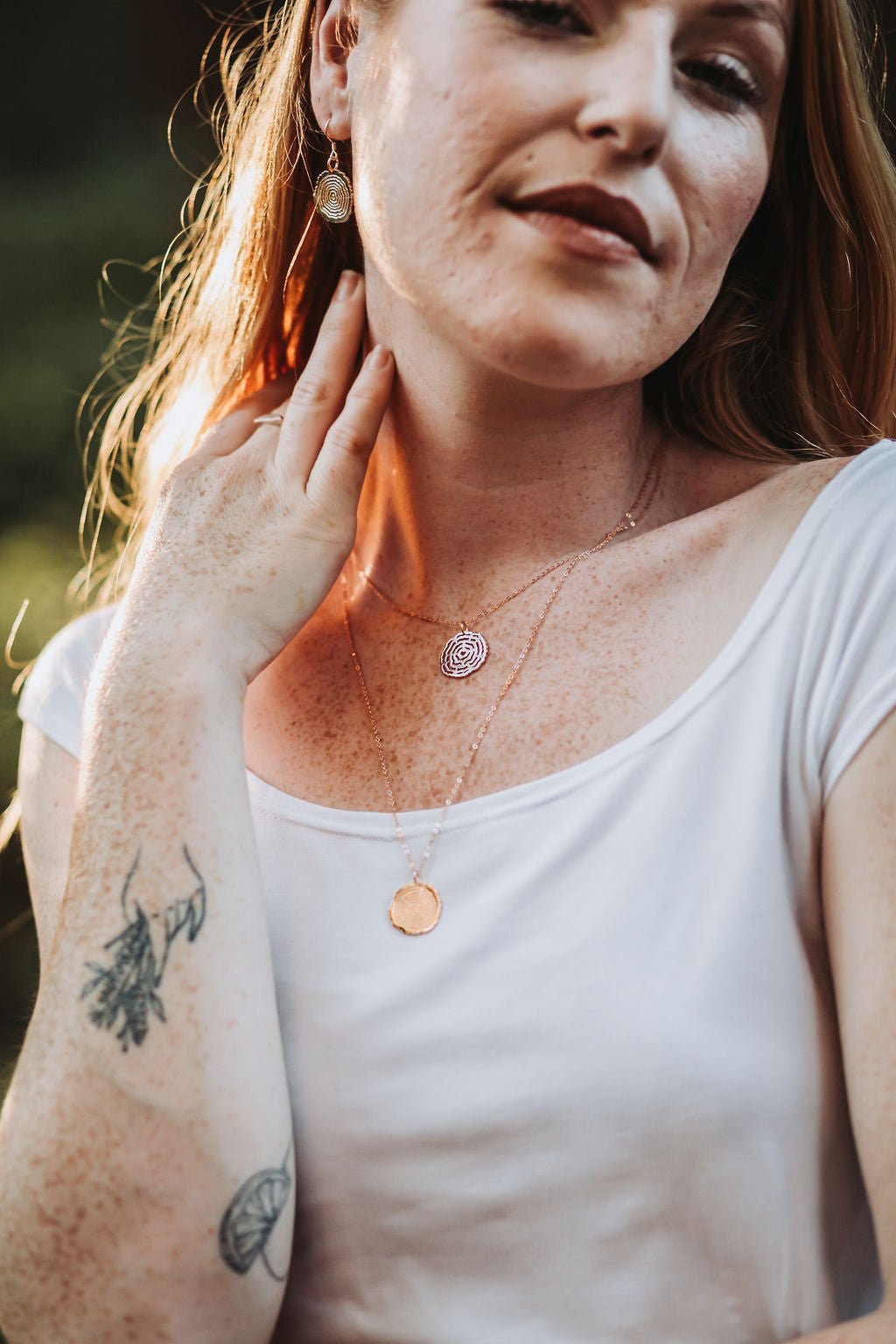 model wearing 18k plated rose gold  plated Vita and Matsuyo necklaces